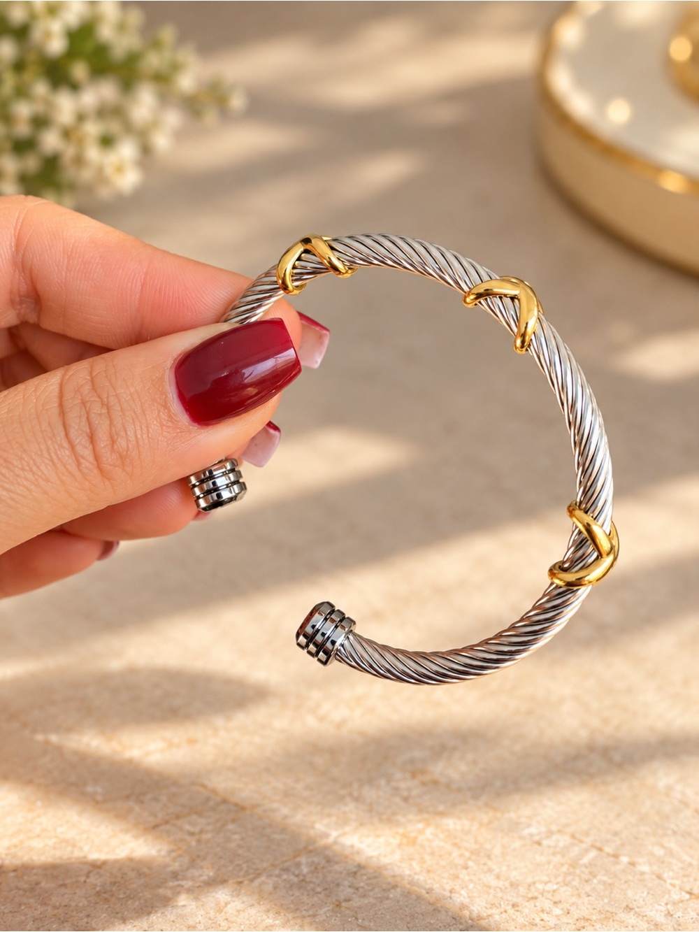 REVOLVE Two-Tone Twisted Cable Cuff Bracelet in Silver and Gold